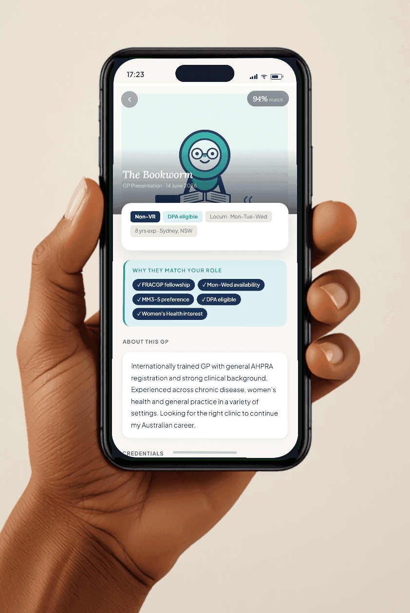 A clinician holding a phone showing the Heart Bridge Health app