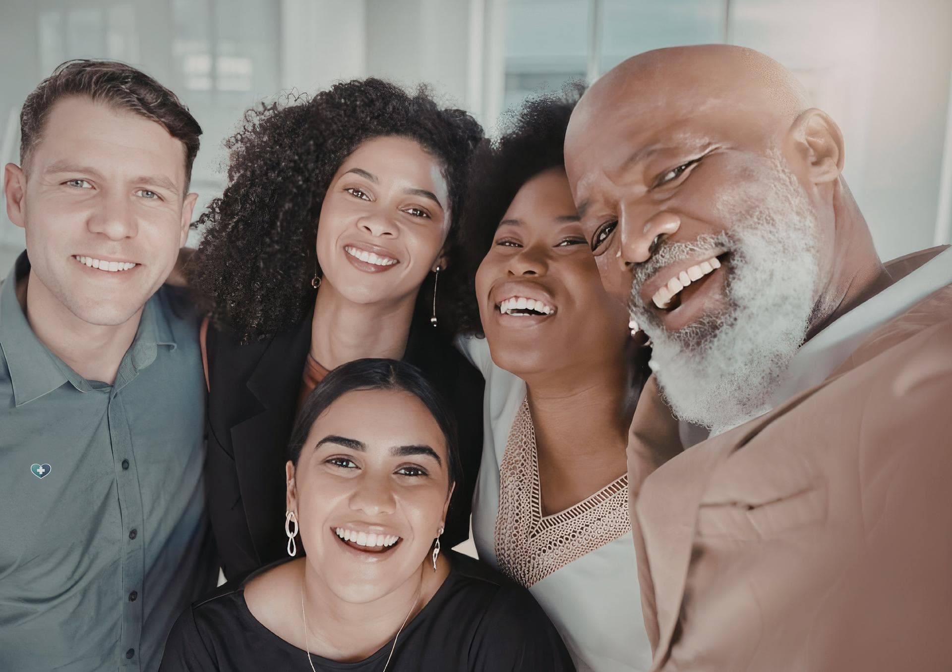 Diverse group of happy people smiling — Heart Bridge Health referral program